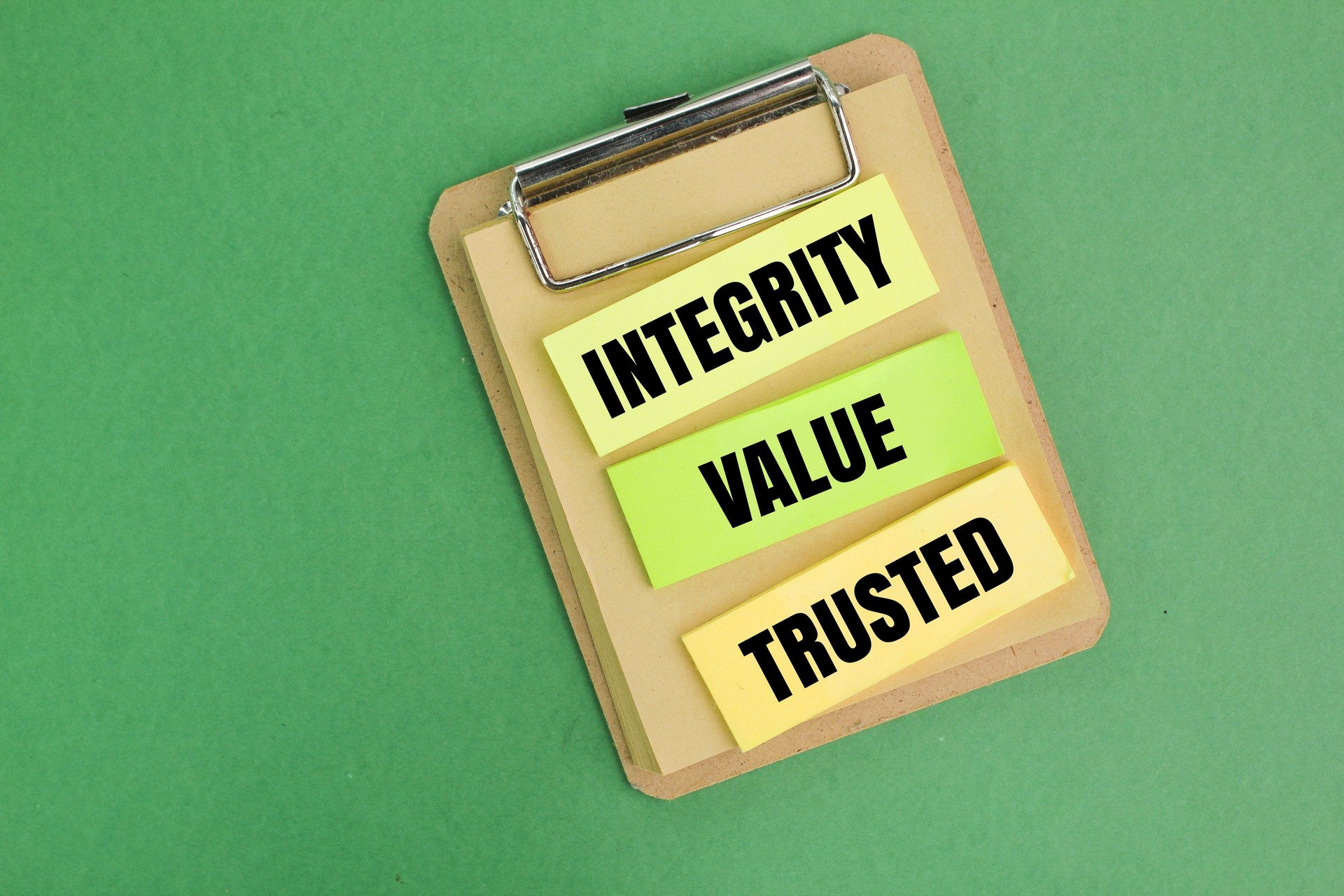 colored paper with the words integrity, value, trusted. the concept of self-worth or self-education. CORE VALUES, TRUST, ETHICS, INNOVATION, RELIABILITY. self commitment.
